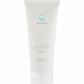 White tube of Age Defying Probiotic Lotion | Zents from the Water collection, featuring minimalist design and labeled with organic shea and lotus ingredients for skincare.