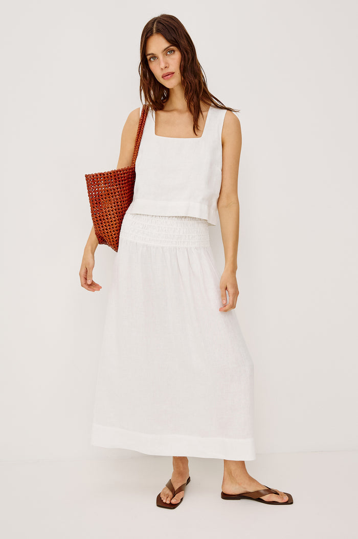 Akira Sleeveless Crop Top with Square Neckline and Wide Shoulder Straps in white Colorway - Front View Featured on Model