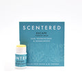 Escape Mini Aromatherapy Balm | Scentered in blue packaging with the balm stick partially open showing yellow balm, featuring scents of oud, frankincense, and sandalwood for skincare and wellness.