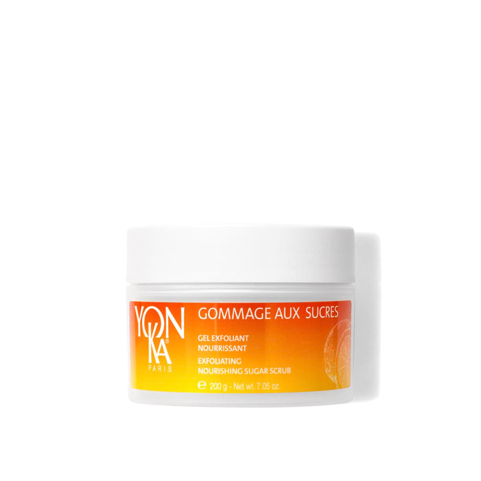 A jar of Gommage Sucre Mandarin Body Scrub | Yon-Ka Paris with bright orange and yellow label, highlighting its exfoliating and nourishing skincare properties.