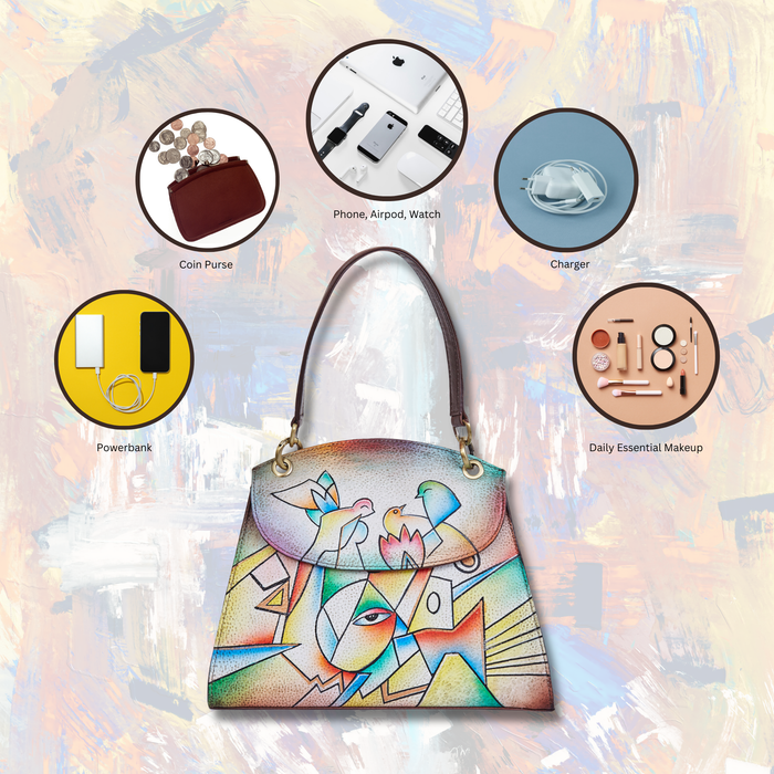 Woman carrying the women's abstract art shoulder handbag for work and office use