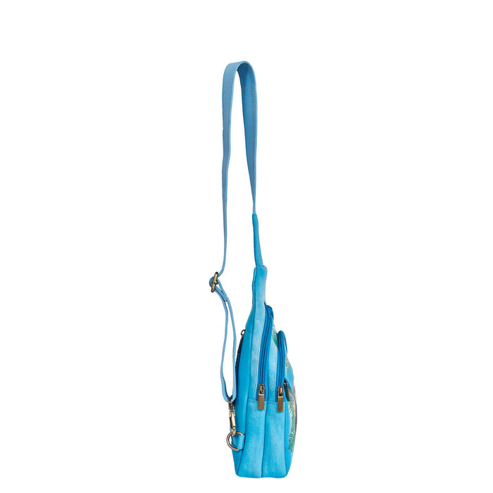 Tropical blue art fanny pack for travel and hands-free carry-side view