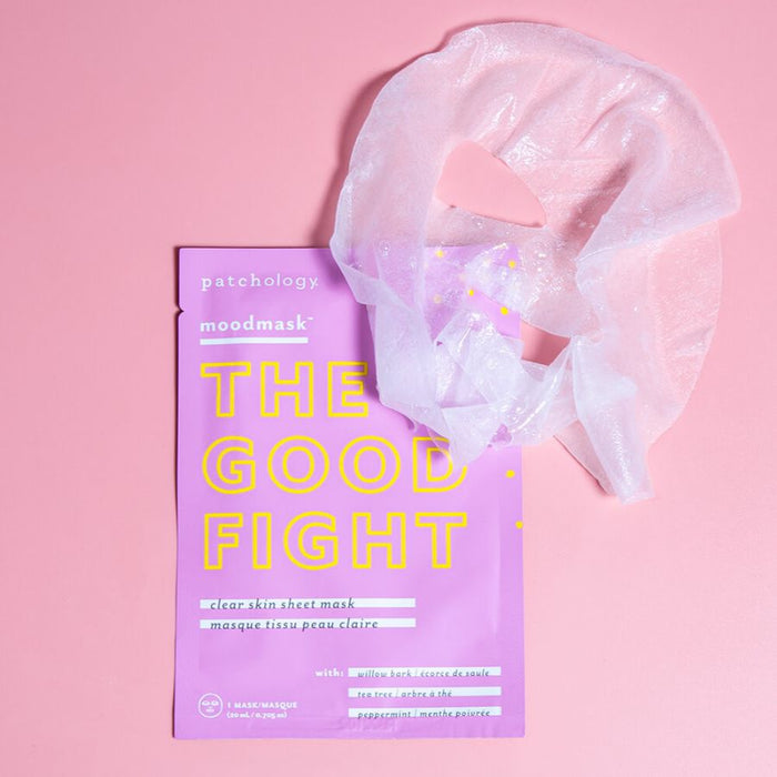 Moodmask - The good fight | Patchology clear skin sheet mask with peppermint and tea tree extract displayed on a pink background next to the translucent mask sheet.